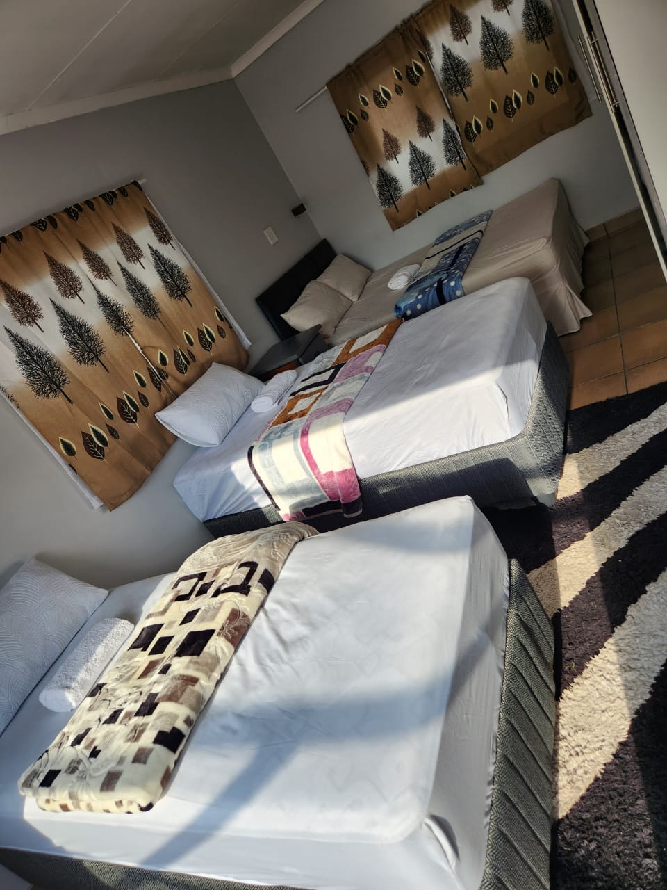 Triple room with curtains